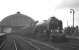 A1 Pacific no 60131 <I>Osprey</I> of Copley Hill shed photographed at Stockton in March 1965 with the 6 coaches of the RCTS Tyne-Solway Rail Tour from Leeds City bound for Carlisle via Newcastle and returning to Leeds via the S&C. [The overall roof at Stockton station was removed in 1979.]<br><br>[K A Gray 21/03/1965]