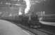 Scene at Edinburgh's Princes Street station in May 1964 as snowplough-fitted Black 5 no 45126 prepares to leave with the 3-coach 1.20pm service to Lanark.<br><br>[K A Gray 18/05/1964]