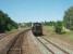 Drivers eye view from the front of a DMU on the Saintes to Angeloume line as it enters the loop at Chateauneuf sur Charente. 63786, a single cab diesel previously seen shunting at Saintes [see image 24596] is heading a long train of open wagons in the opposite direction. <br><br>[Mark Bartlett 23/06/2009]