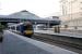 Breaking the Turbostar monotony at Glasgow Queen Street on 25 July 2009 is a Class 156 in SPT livery over on platform 1 waiting to depart with a service for Anniesland.<br><br>[John McIntyre 25/07/2009]