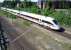 A Hamburg-Lubeck ICE approaching the bridge under Moislinger Ailee near Lubeck station on 20 July 2009. Two days later another ICEtrain suffered major damage when children placed concrete blocks and iron fencing on the track.<br>
<br><br>[John Steven 20/07/2009]