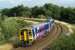 A Blackpool to York service climbs away from Farington Curve Jct and sweeps around the curve, before crossing the WCML and heading east through Lostock Hall on 1 August 2009. The Ormskirk line which also leaves the WCML at Farington Curve Jct is behind the camera to the right. <br><br>[John McIntyre 01/08/2009]