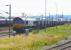 EWS 66034 stands in Falkland yard with a train of coal hoppers on 4 August 2008.<br>
<br><br>[Colin Miller 04/08/2008]