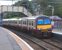 Scene at Hillfoot on 8 August 2009, with 320 310 on a High Street service.<br><br>[David Panton 08/08/2009]