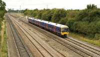 166201 eastbound for Paddington on 18 August, taken from a farmer's overbridge to the east of Didcot. A very good spot for a lot of train movements, especially if you like a zillion DMUs and HSTs!<br>
<br><br>[Peter Todd 18/08/2009]