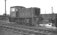 NBL Class D2/10 diesel hydraulic 0-4-0 D2730 of St Margarets shed in the yards at Leith South in the early 1960s. In the left background is part of the coaling stage of Seafield shed, the facility built by the Caledonian in 1902. It was subsequently leased to the NB and eventually became an outpost for St Margarets freight locomotives prior to eventual demolition in 1966. In the right background is part of the embankment that carried the Caledonian line up to the bridge over Seafield Road.<br><br>[K A Gray //]