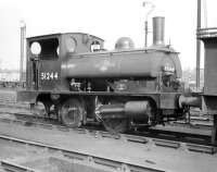 One of the attractive Aspinall ex-L&YR 0-4-0ST <I>Pugs</I> used for shunting in and around the extensive Goole docks, where it spent almost its entire life. Seen here (minus various crucial parts) standing in the shed sidings in the early 1960s. It was officially withdrawn from 53E in March of 1962 and cut up at Crewe works the following month.<br><br>[Robin Barbour Collection (Courtesy Bruce McCartney) //1960]