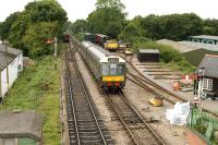 A DMU waiting to pull into the platform at Medstead and Four Marks on the Mid-Hants Railway on 27 August 2009.<br>
<br><br>[Peter Todd 27/08/2009]