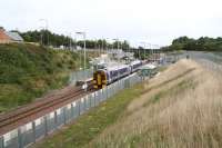 The 0948 Edinburgh - Bathgate 158 service pulls away from the recently commissioned westbound platform at Livingston North on 28 August 2009. <br><br>[John Furnevel 28/08/2009]