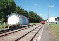 This preserved French railway known as the Gulls' Line operates a steam service on Sundays over the twelve miles from Saujon to La Tremblade. Passengers are carried in converted goods wagons, as seen here at the intermediate station of Chaillevette where the depot and workshop are sited. View north westwards towards La Tremblade. <br><br>[Mark Bartlett 22/06/2009]