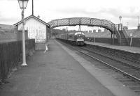 A down <I>Thames - Clyde Express</I> Saturday relief working runs into Kirkconnel station on 6 August 1966 behind a <I>Peak</I> type 4 locomotive.<br><br>[Colin Miller 06/08/1966]
