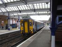 On 2 September 156 494 pulls into Ayr with a service to Kilmarnock over the <I>Burns Line</I>. Loadings are generally light, at least between Ayr and Kimarnock: I caught this train and had the carriage to myself all the way.Ayr and Kilmarnock stations have the same platform arrangement and, as at Kilmarnock, most through trains in both directions use Platform 3.The ticket barrier on Platform 4 (left) is needed to prevent free access to the other platforms (there is a ticket machine on that side of the station). <br>
<br><br>[David Panton 02/09/2009]