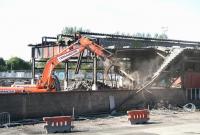 Bathgate no more.... the demolition squad in the process of tearing down the former 64F shed on 11 September 2009. [See image 22760]<br>
<br><br>[John Furnevel 11/09/2009]