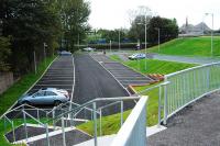 Dalreoch's new extension to the station carpark is open. The line is to the left. This carpark features a very pleasant area complete with picnic benches down by the River Leven.<br><br>[Ewan Crawford 26/09/2009]