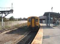 The once extensive through station at Barry Island  is now a single track terminus but still enjoys a half hourly service to Cardiff.  150285 is ready to leave for Aberdare and some of the old station features can be seen as well as the modern shelter.<br><br>[Mark Bartlett 18/09/2009]
