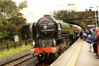Tornado arrives at Long Preston 'filling' station on 03 October 2009 whilst on a day out to Carlisle. The crew try to position the loco at the 'pump' but the hose didn't reach the tank. The solution will appear in a later photo. <br><br>[John McIntyre 03/10/2009]