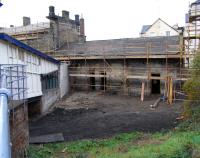 Ongoing restoration work at Burntisland on 30 September. The long disused outbuilding which adjoined the wooden passageway has been swept away.<br><br>[David Panton 30/09/2009]