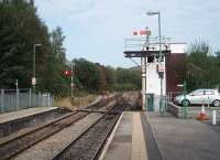 The start of the single line section to Rhymney is controlled by semaphore lower quadrant signals from Bargoed's plain looking Signal Box. Some services from Cardiff terminate here and then return down the Rhymney Valley.<br><br>[Mark Bartlett 19/09/2009]