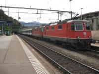 Not one but two electric locos for the 16.00 Sundays only Chiasso - Zurich express, seen here entering Bellinzona.<br><br>[Michael Gibb 11/10/2009]