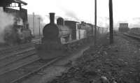Scene alongside the coaling stage at 52B Heaton shed in the late 1950s / early 1960s looking south west towards the huge Parsons engineering works that stood on nearby Shields Road at that time. <br><br>[Robin Barbour Collection (Courtesy Bruce McCartney) //]