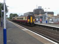 156 509 picks up custom on a Barrhead to Glasgow service at Crossmyloof on Saturday 8 August 2009.<br><br>[David Panton 08/08/2009]