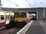 Platform scene at Glengarnock on 2 September, with 318 260 pulling in for Ayr while a 334 pulls out for Glasgow Central.<br><br>[David Panton 02/09/2009]