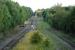 Looking south over the remains of former mainline station at Calvert. Beyond the island platform is the Shanks and McEwan rubbish unloading depot. The depot serves the nearby landfill site which was formerly a clay pit of the London Brick Company. This portion of the former Great Central Railway's London Extension continues north as far as Claydon Junction and remains intact south to Quainton Road although the out of use Princes Risborough route only reaches Akeman Street.<br><br>[Ewan Crawford 06/09/2009]