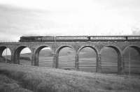 Peppercorn class A2 Pacific no 60528 <I>Tudor Minstrel</I> on Shankend Viaduct with the Warwickshire Railway Society 'Waverley Railtour' of 11 December 1965 on its way to Edinburgh.<br><br>[Robin Barbour Collection (Courtesy Bruce McCartney) 11/12/1965]