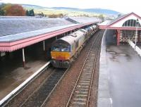 Back end of an RHT train heading north through Aviemore on 8 October 2009 with DRS 66413 bringing up the rear.<br><br>[Bruce McCartney 08/10/2009]