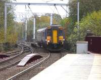 Northbound 156456 approaches the now fenced off wooden southern end to the platforms at Coatbridge Central with a service for Cumbernauld on 28 October 2009.<br><br>[David Panton 28/10/2009]