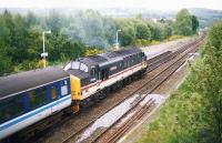 37404 <I>Ben Cruachan</I> leaves Dingwall on 12 May 1993 with the 1914hrs train to Kyle of Lochalsh.<br><br>[Ken Browne 12/05/1993]