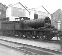 Partially dismantled class J21 0-6-0 no 65099 stands in the yard at Darlington Works on 27 May 1962. This locomotive had initially been identified as a possible candidate for preservation, but was eventually cut up here in early 1966.<br><br>[David Pesterfield 27/05/1962]