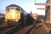 Shunting the Distillers Company sidings at Haymarket on an Edinburgh University Railway Society brake van trip in early 1973. Haymarket East Junction is in the background and the spires of St Mary's Cathedral stand on the skyline.<br>
<br><br>[David Spaven //1973]