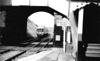 A DMU leaves Caerleon on an 'Eastern Valleys' service to Brynmawr. The  station closed in the early 1960's when the valley service was withdrawn  but the line is still open carrying Cardiff to Manchester and other  services<br><br>[John Thorn //1959]