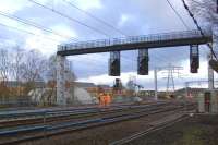 Work taking place at Elderslie on 15th November to upgrade track and extend the loop line. The new gantry incorporating signalling for the revised layout is now operational.<br><br>[Graham Morgan 15/11/2009]