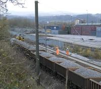 Ballast train alongside the WHM freight depot at Elderslie during track replacement and upgrading work on 15 November. New track to the right is already in place and awaiting the attention of the tamper.  <br><br>[Graham Morgan 15/11/2009]