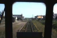 View from the rear of a DMU leaving Cairnbulg station for Fraserburgh on the former St Combs Light Railway on 1 May 1965, the last day of scheduled passenger services on the branch. <br><br>[Frank Spaven Collection (Courtesy David Spaven) 01/05/1965]