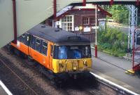 A class 303 emu calls at Whitecraigs with a Neilston-Glasgow service in 2000<br>
<br><br>[David Spaven //2000]