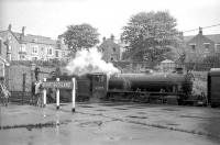 K1 2-6-0 no 62005 stops to take on water at Bishop Auckland on 20 May 1967 on the way back from Westgate with the SLS <I>Three Dales Railtour</I> returning to Middlesbrough.<br>
<br><br>[Robin Barbour Collection (Courtesy Bruce McCartney) 20/05/1967]