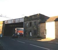 Incle Street, Paisley, just to the east of Gilmour Street station, photographed in November 2009. The squareish building was, for many years, known as <I>The Tabernacle</I> - presumably a religious hall - but also the base of Wallneuk Junction Signal Box. The hall was there when the box was operational - which must have been a bit noisy with the lever frame active and trains passing above.<br><br>[Colin Miller 30/11/2009]