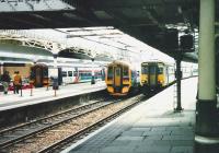 158s at platforms 5 and 6S at Aberdeen station await their departure times with southbound services on 17 July 1999, while 156 478 is about to leave platform 7S and head for Inverness.<br><br>[David Panton 17/07/1999]