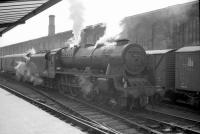 Rebuilt <I>Patriot</I> 4-6-0 no 45545 <I>Planet</I> stands in the sidings on the west side of Carlisle station in the early 1960s at the head of a northbound parcels train.<br><br>[Robin Barbour Collection (Courtesy Bruce McCartney) //]