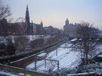 West approach to Waverley in the snow. No interesting trains seen, just very busy ones, so instead there's the big wheel and some pristine snow.<br><br>[Ewan Crawford 24/12/2009]