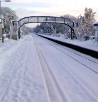 View south from Carrbridge station on 27 December 2009, with the 'signs of life' having been left by a passing class 37 on snow clearance duty.   <br><br>[Gus Carnegie 27/12/2009]