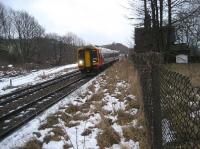 A westbound East Midlands Trains Class 158 passes Buxworth on 29 December 2009 with a service to Manchester. The westbound platform and station building still exist, although the platform is overgrown and fenced off. This was formerly a 4 track section between New Mills South Junction and Chinley North Junction, the other two tracks being on the left of the existing lines. I can confirm that it was much colder than it looks with a very strong easterly  wind blowing at ten past three on a late December afternoon!<br><br>[John McIntyre 29/12/2009]
