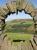 Framed by Andy Goldsworthy's sculpture <I>Touchstone North</I>, a Carlisle-Glasgow service threads though Drumlanrig Gorge near Ardoch farm.<br><br>[Andy Kirkham 11/09/2009]