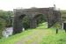 Riverside path alongside the Dee at Tongland, north of Kirkcudbright, in August 2009, with the remains of Tongland railway viaduct standing on the east bank of the river. The arches of the western approach to the viaduct now form the border of a private garden on the opposite shore. Note some of the rubble from the long demolished deck and piers of the old structure dumped in the field beyond the right hand arch. The Kirkcudbright branch closed in 1965. <br><br>[John Furnevel 31/08/2009]