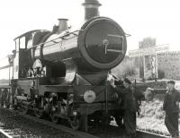 Ex-GWR 3440 <I>City of Truro</I> and crew pose for a publicity shot alongside the ECML border sign on a visit to Scotland in the late 1950s.<br><br>[Gordon Smith Collection (Courtesy Ken Browne) //]