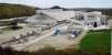 The China Clay <i>Rock Dries Siding</i> site at Goonbarrow Junction. The route to Par/St Blazey is off to the right and beyond the buildings the line continues on to Newquay. In this shot, but very distant, are a 66 with a china clay train, two 08s and Goonbarrow Junction signalbox.<br><br>[Ewan Crawford 18/11/2009]