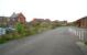 Part of the once bustling goods yard that served the City of Ripon, seen from the main entrance on Hutton Bank on 24 April 2009. Part of the large former station building on the old Leeds - Northallerton main line (closed  to passengers in March 1967) can be seen on the left. On the right is one of several goods sheds which, along with other ex-railway properties on the site, is currently in use as commercial premises. [See image 25136]<br>
<br><br>[John Furnevel 24/04/2009]